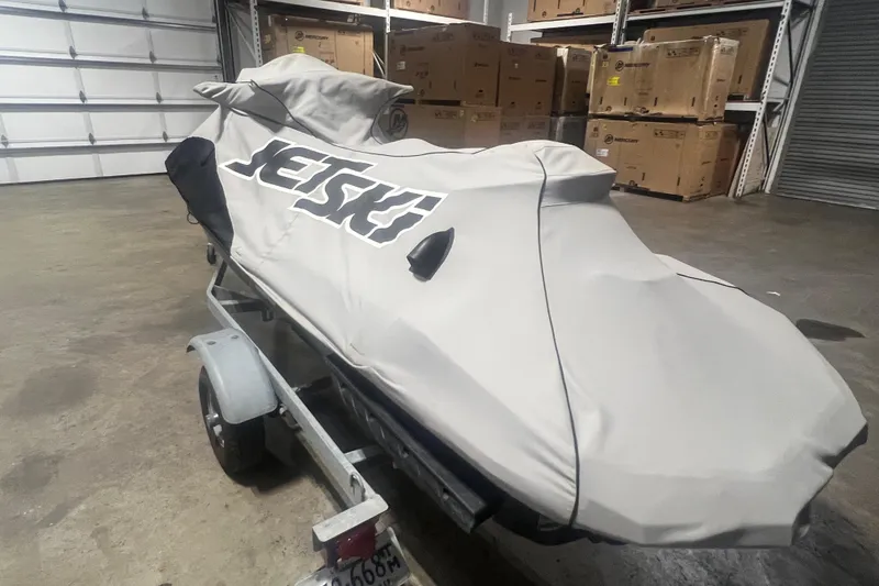 Slide: The Image of 2023 Kawasaki Jetski Ultra 310LX-S covered in a garage, on a trailer. - 32