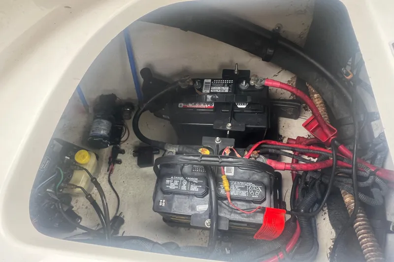 Slide: The Image of Engine compartment of a 2006 Sea Ray 240 Sundeck with MerCruiser 350 MAG MPI. - 25