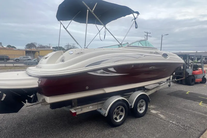Slide: The Image of Electrical wiring and components inside a 2006 Sea Ray 240 Sundeck boat. - 29