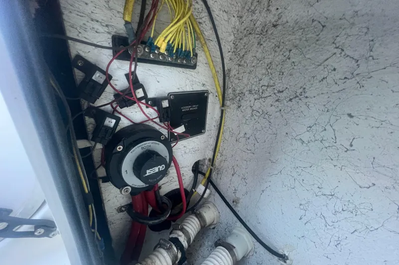 Slide: The Image of Electrical wiring and components inside a 2004 Trophy 2352 Walkaround boat. - 18