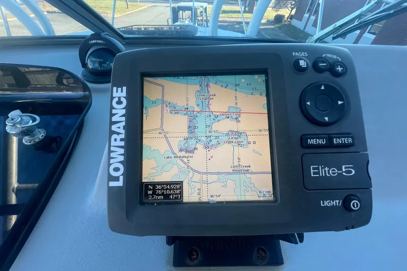 Slide: The Image of Lowrance Elite-5 GPS on 2004 Trophy 2352 Walkaround boat dashboard. - 27