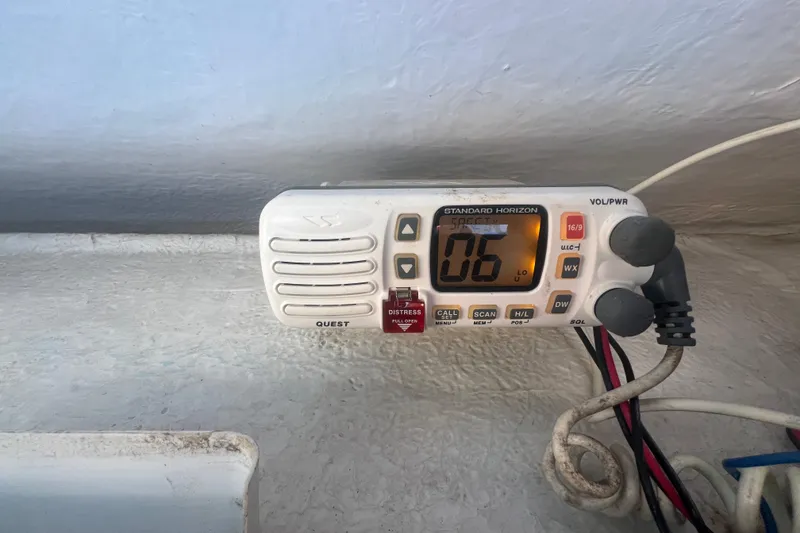 Slide: The Image of Standard Horizon marine radio on 2004 Trophy 2352 Walkaround boat dashboard. - 28