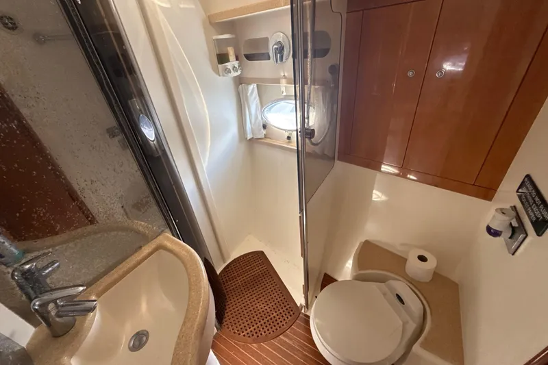 Slide: The Image of Luxurious bathroom in 2002 Viking Princess V50 yacht with modern amenities. - 17