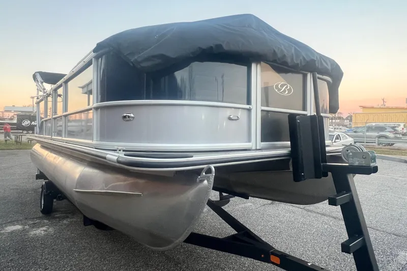 Slide: The Image of 2024 Bentley Pontoons 200 Navigator on trailer at sunset. - 10