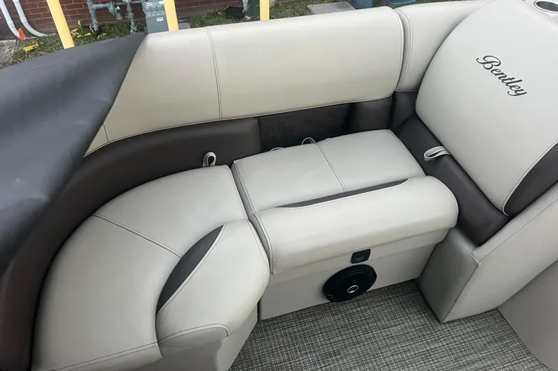 Slide: The Image of 2024 Bentley Pontoons 200 Navigator interior seating with elegant upholstery and speaker system. - 17