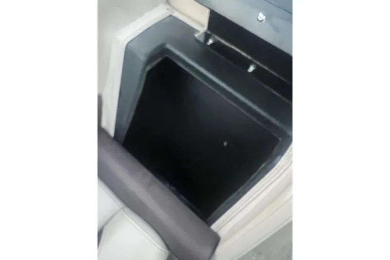 Slide: The Image of Storage compartment in 2024 Bentley Pontoons 200 Navigator boat interior. - 19