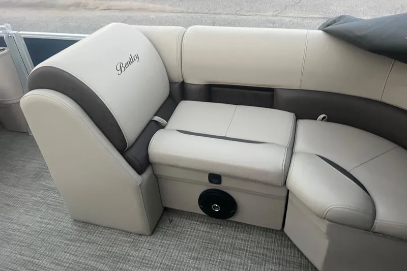 Slide: The Image of 2024 Bentley Pontoons 200 Navigator interior seating with elegant beige upholstery. - 20
