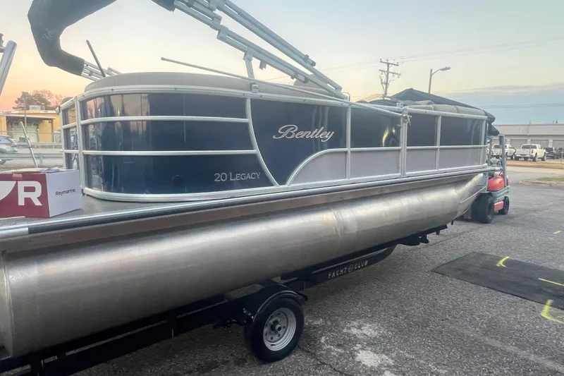 Slide: The Image of 2024 Bentley Pontoons 200 Navigator on trailer at sunset. - 8