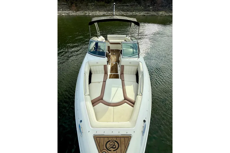 Slide: The Image of 2011 Cobalt 276 boat with spacious seating on calm water. - 25