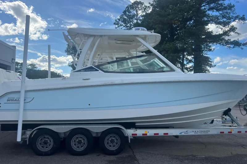 Slide: The Image of 2023 Boston Whaler 280 Vantage boat on trailer, side view. - 19