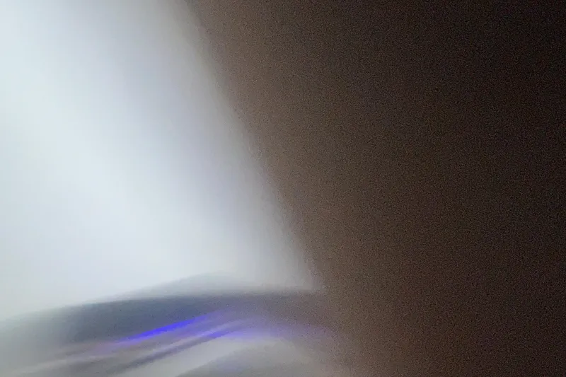 Slide: The Image of Blurry abstract image with light and dark areas, possibly showing motion. - 33