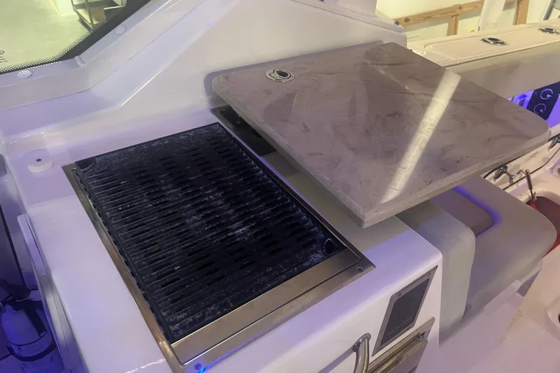 Slide: The Image of 2023 Boston Whaler 280 Vantage boat grill and countertop detail. - 37
