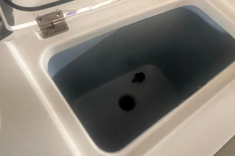 Slide: The Image of Livewell compartment on a 2023 Boston Whaler 280 Vantage boat. - 47