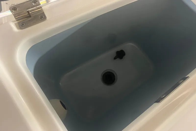 Slide: The Image of Livewell compartment on a 2023 Boston Whaler 280 Vantage boat. - 48