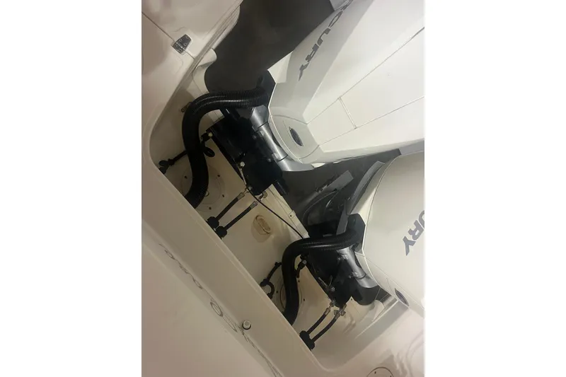 Slide: The Image of 2023 Boston Whaler 280 Vantage boat engine compartment with Mercury outboards. - 50