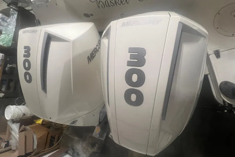 Slide: The Image of Twin Mercury 300 outboard engines on a 2023 Boston Whaler 280 Vantage boat. - 54