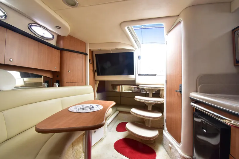 Slide: The Image of Luxurious interior of 2006 Sea Ray 320 Sundancer yacht with modern amenities. - 14