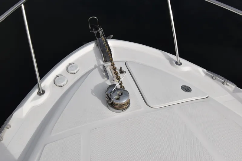 Slide: The Image of Bow of 2006 Sea Ray 320 Sundancer with anchor chain and winch. - 3