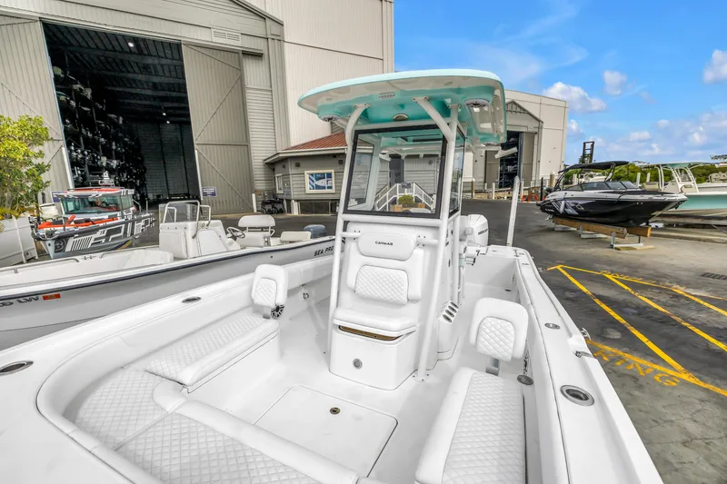 Slide: The Image of 2025 Caymas 28 HB boat at marina, showcasing sleek design and spacious interior. - 39