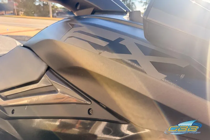 Slide: The Image of 2021 Yamaha WaveRunner FX SVHO close-up with sleek design and logo in sunlight. - 10