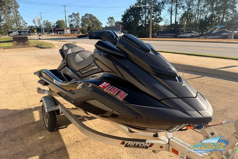 Slide: The Image of 2021 Yamaha WaveRunner FX SVHO on trailer, parked outdoors in sunny setting. - 3