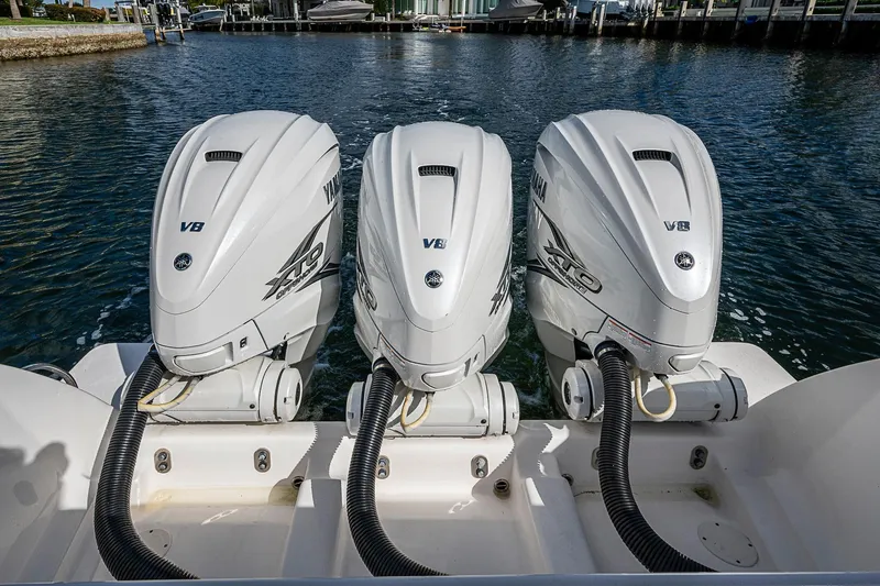 Slide: The Image of Triple Yamaha V8 outboard engines on a 2019 Intrepid 407 Nomad FE boat. - 25