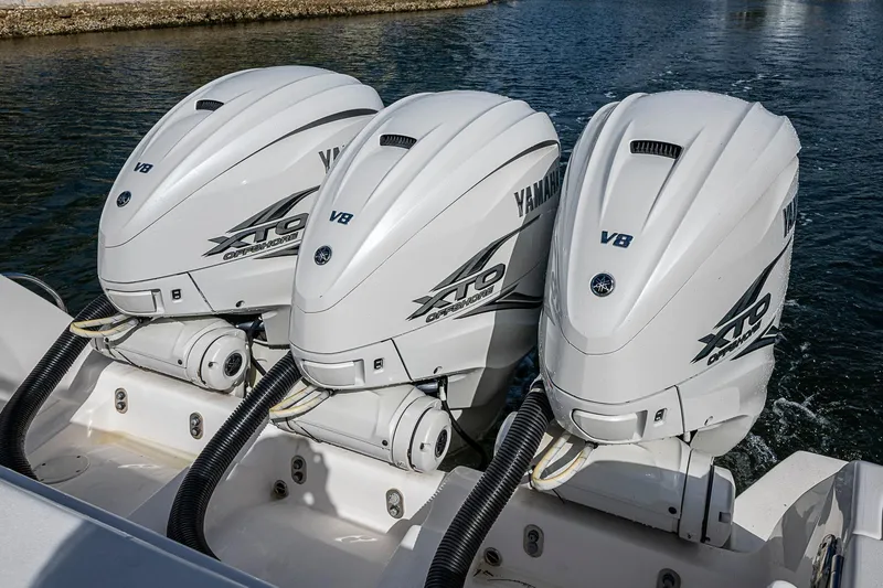 Slide: The Image of Triple Yamaha XTO Offshore V8 engines on a 2019 Intrepid 407 Nomad FE boat. - 26