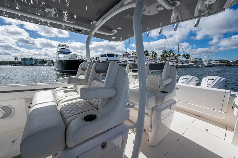 Slide: The Image of Luxurious interior of 2019 Intrepid 407 Nomad FE boat docked at marina. - 33