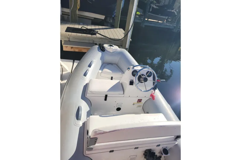 The Image of 2017 AB Inflatables Mares 10 VSX boat on water with Yamaha outboard motor. - 0