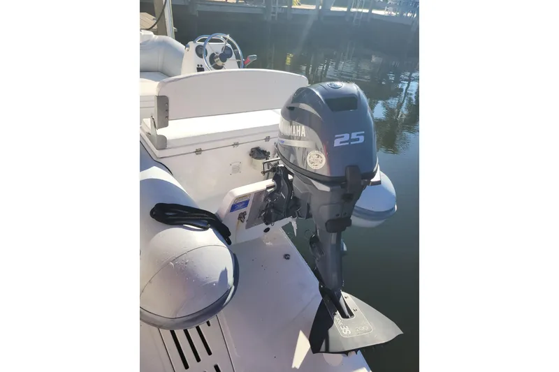 Slide: The Image of 2017 AB Inflatables Mares 10 VSX boat interior with steering wheel and seating. - 3