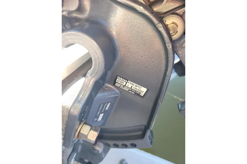 Slide: The Image of Covered 2017 AB Inflatables Mares 10 VSX boat docked by waterfront. - 9