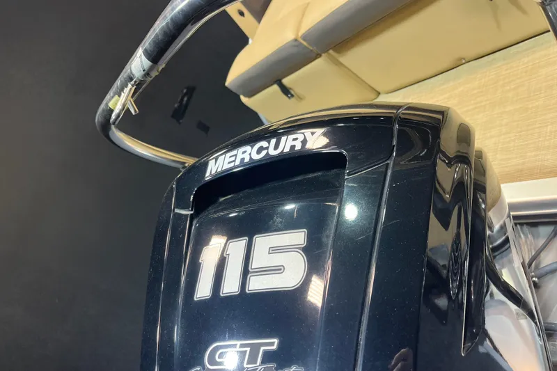 Slide: The Image of 2022 Harris Cruiser 230 with Mercury 115 outboard motor, close-up view. - 5