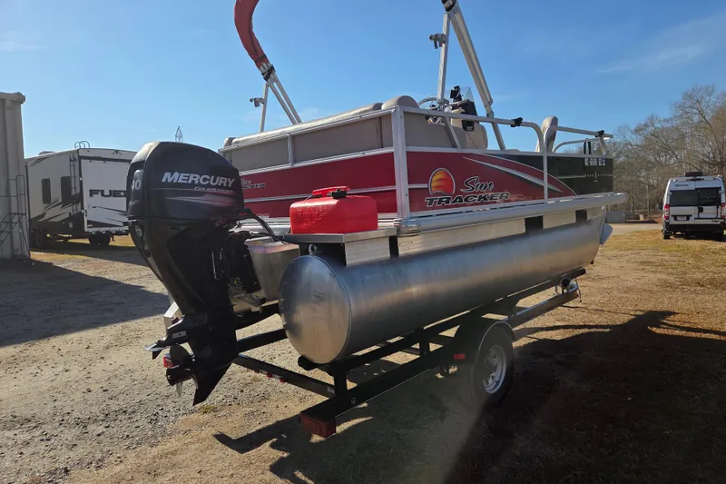 Slide: The Image of 2014 Sun Tracker Bass Buggy 16 DLX pontoon boat with Mercury outboard motor. - 4