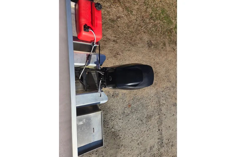 Slide: The Image of Top view of 2014 Sun Tracker Bass Buggy 16 DLX boat engine and fuel tank. - 7