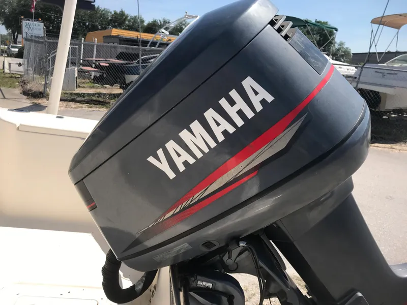 Slide: The Image of Yamaha outboard motor on a 2001 Scout 185 Sportfish boat. - 10