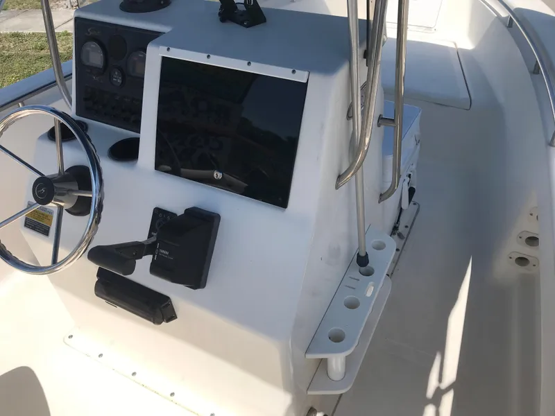 Slide: The Image of Helm console of a 2001 Scout 185 Sportfish boat. - 23