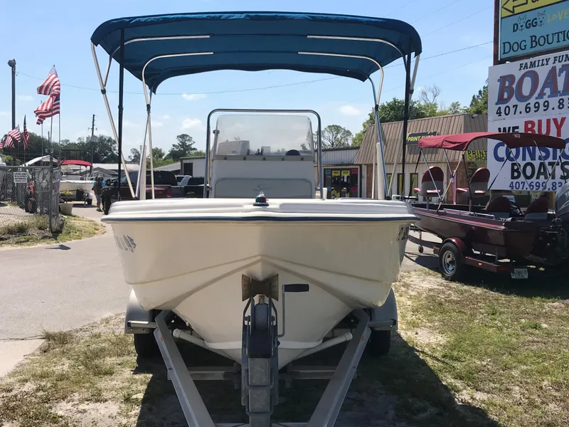 Slide: The Image of Scout 185 Sportfish 2001 on trailer with blue canopy. - 3