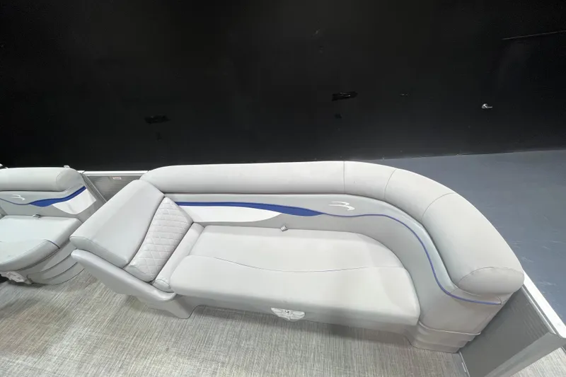 Slide: The Image of 2023 Bennington 22 FS boat interior with gray and blue seating. - 6