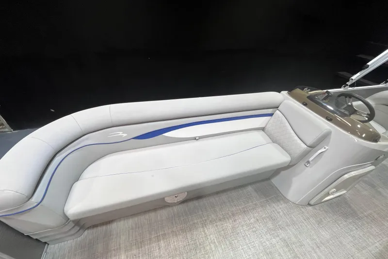 Slide: The Image of 2023 Bennington 22 FS boat interior with sleek seating and modern design. - 7