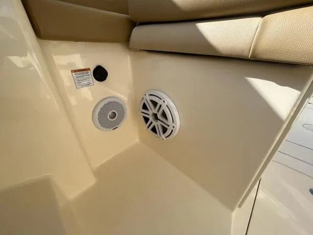 Slide: The Image of Speakers and controls on a 2019 Scout 255 Dorado boat. - 10