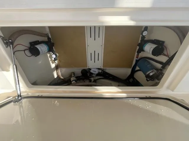 Slide: The Image of Interior view of 2019 Scout 255 Dorado boat engine compartment. - 12