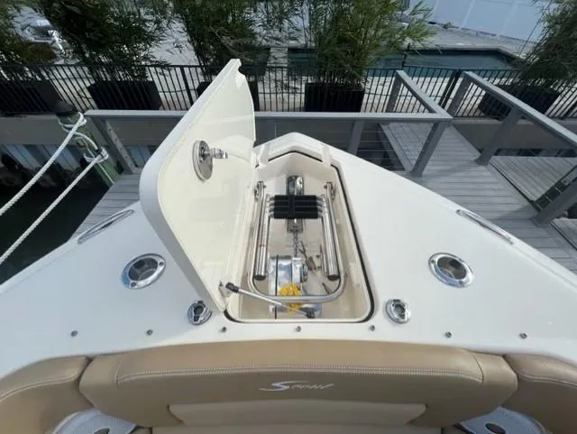 Slide: The Image of 2019 Scout 255 Dorado boat with open anchor compartment. - 13