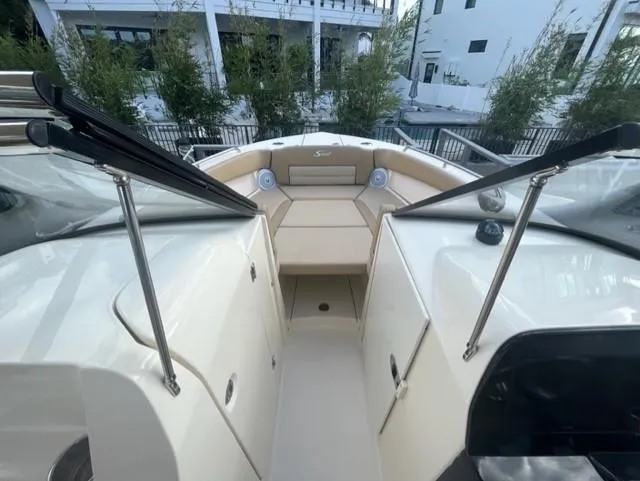 Slide: The Image of 2019 Scout 255 Dorado with beige interior and glass windows. - 2