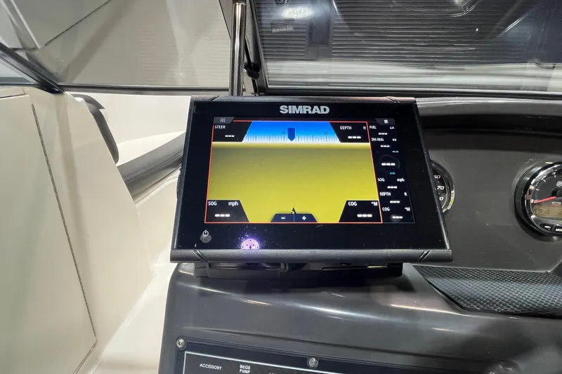 Slide: The Image of Simrad display on 2022 Bayliner VR6 Bowrider OB dashboard, showing navigation data. - 12