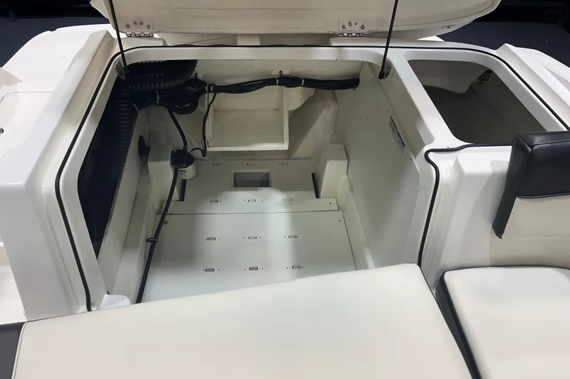 Slide: The Image of 2022 Bayliner VR6 Bowrider OB engine compartment, showcasing interior layout and wiring. - 14