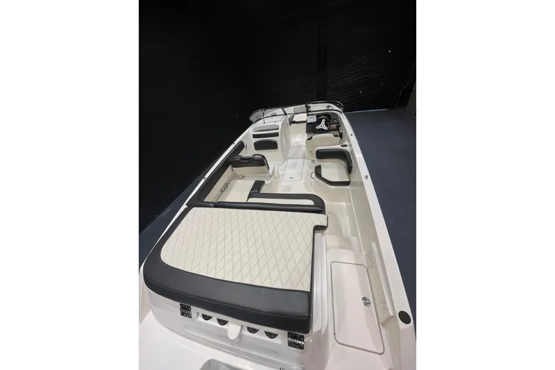 Slide: The Image of 2022 Bayliner VR6 Bowrider OB interior with spacious seating and modern design. - 5