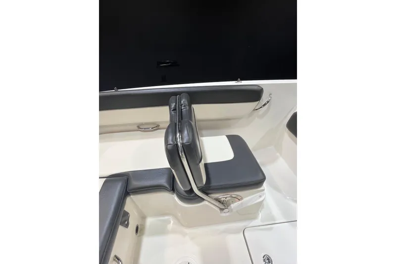Slide: The Image of 2022 Bayliner VR6 Bowrider OB interior seating with sleek design and comfortable upholstery. - 7