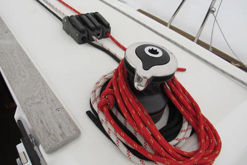 Slide: The Image of Winch and ropes on 2023 Jeanneau Sun Odyssey 349 sailboat deck. - 18