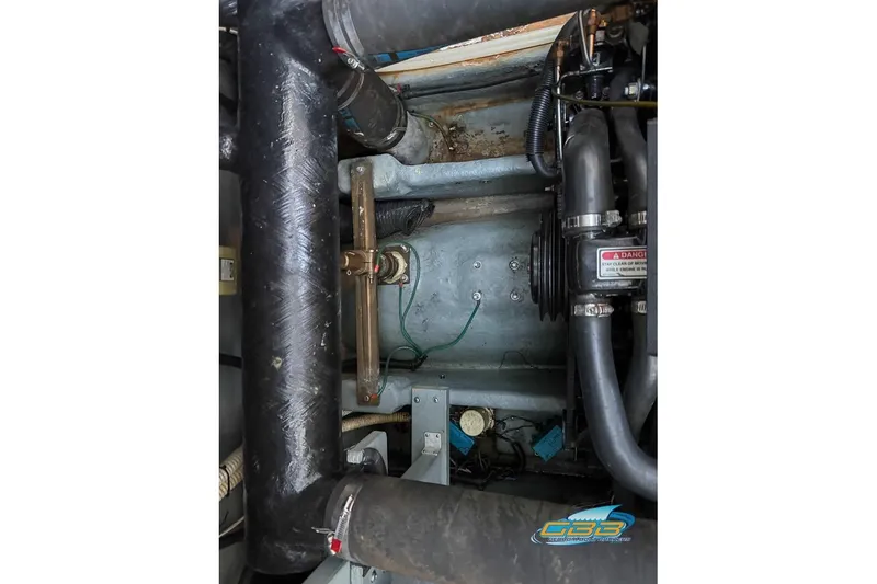 Slide: The Image of Engine compartment of a 1997 Sea Ray 330 Sundancer boat. - 48