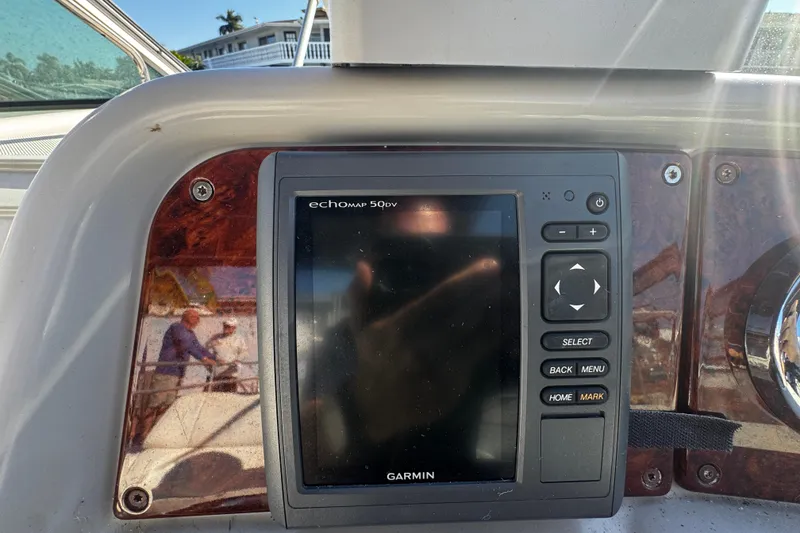 Slide: The Image of Garmin echomap 50dv on 2004 Formula 280 Sun Sport dashboard, reflecting surroundings. - 10